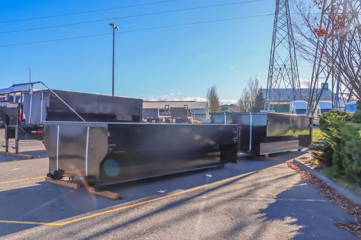 Roll-off dumpster ready for waste disposal at job site for Commercial Dumpster Rental in Clinton